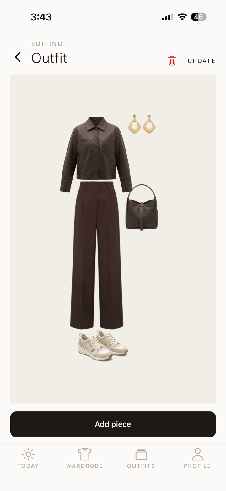Pieces being ticked from the wardrobe and arranged into an outfit